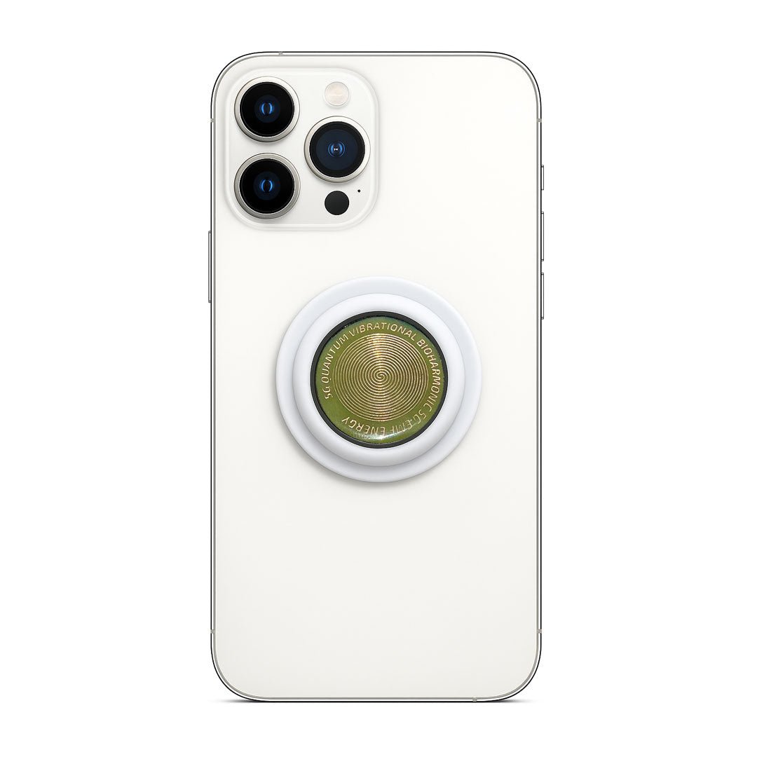 Armonizador EMF de 3.5 cm pegado a la parte trasera de un celular