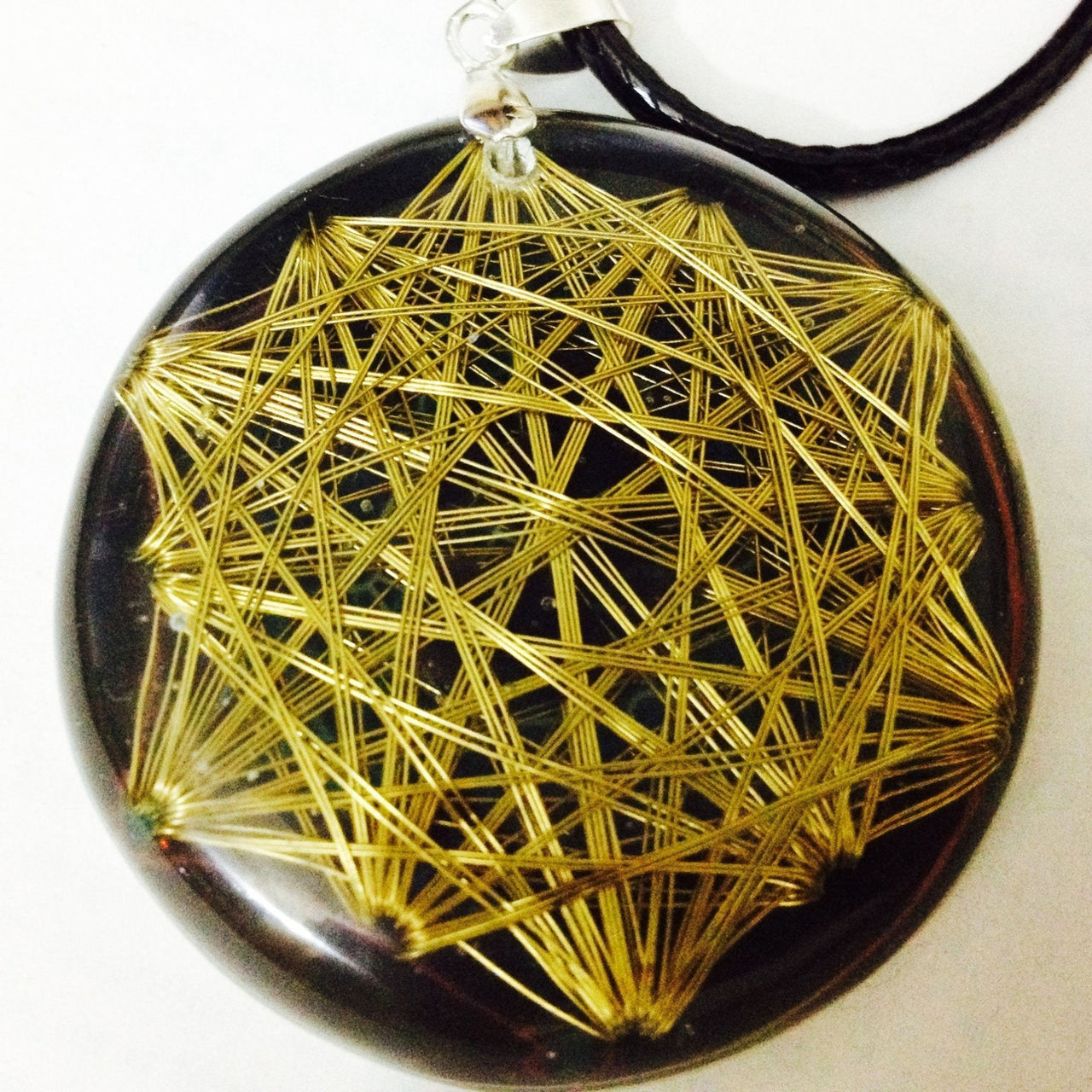 Vector de Equilibrio Dorado con Shungite - Metayantra MǸxico